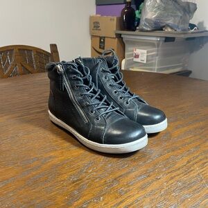 Woman’s Black High-Top Sneakers